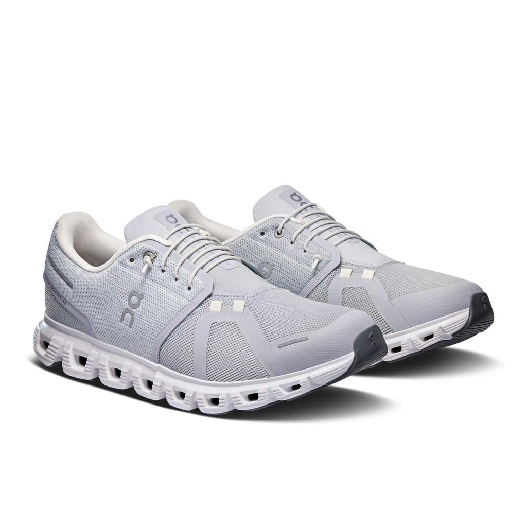 Pair of glacier gray and white lace-up running shoes with padded collars and On logo