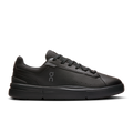 Black low-top lace-up shoes with On logo and rubber sole