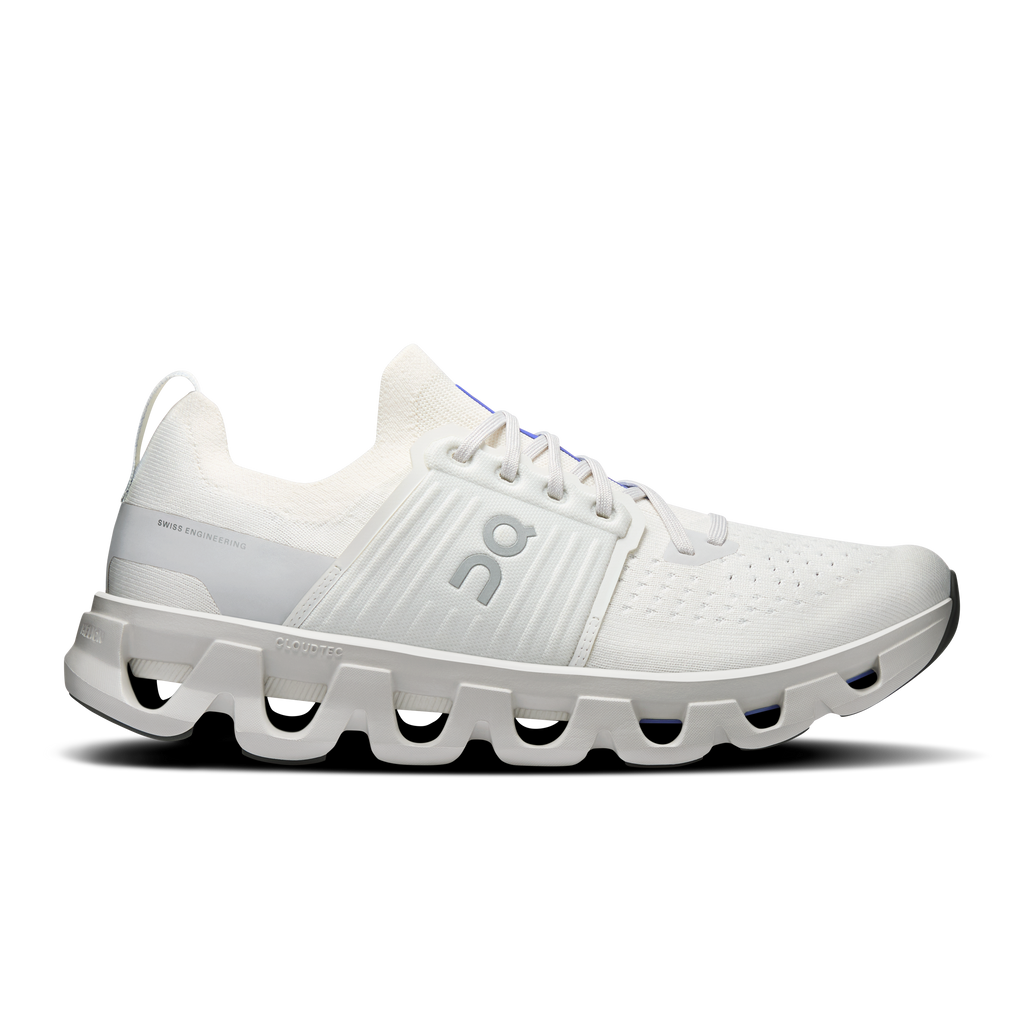 Ivory men's running shoes with CloudTec midsole and blue accent on side