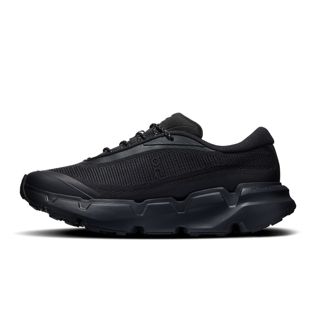 Black lace-up hiking shoes with durable synthetic overlays and rugged lug outsole
