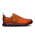 On women's waterproof running shoes, cinnamon/orange lace-up, Cloud-style sole