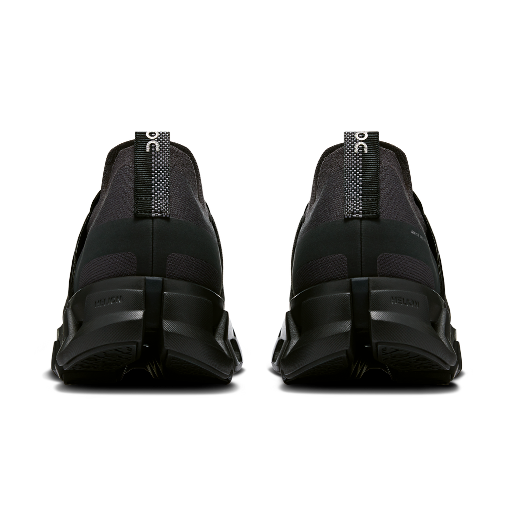 Men's black running shoes heel view with pull tab and cushioned sole