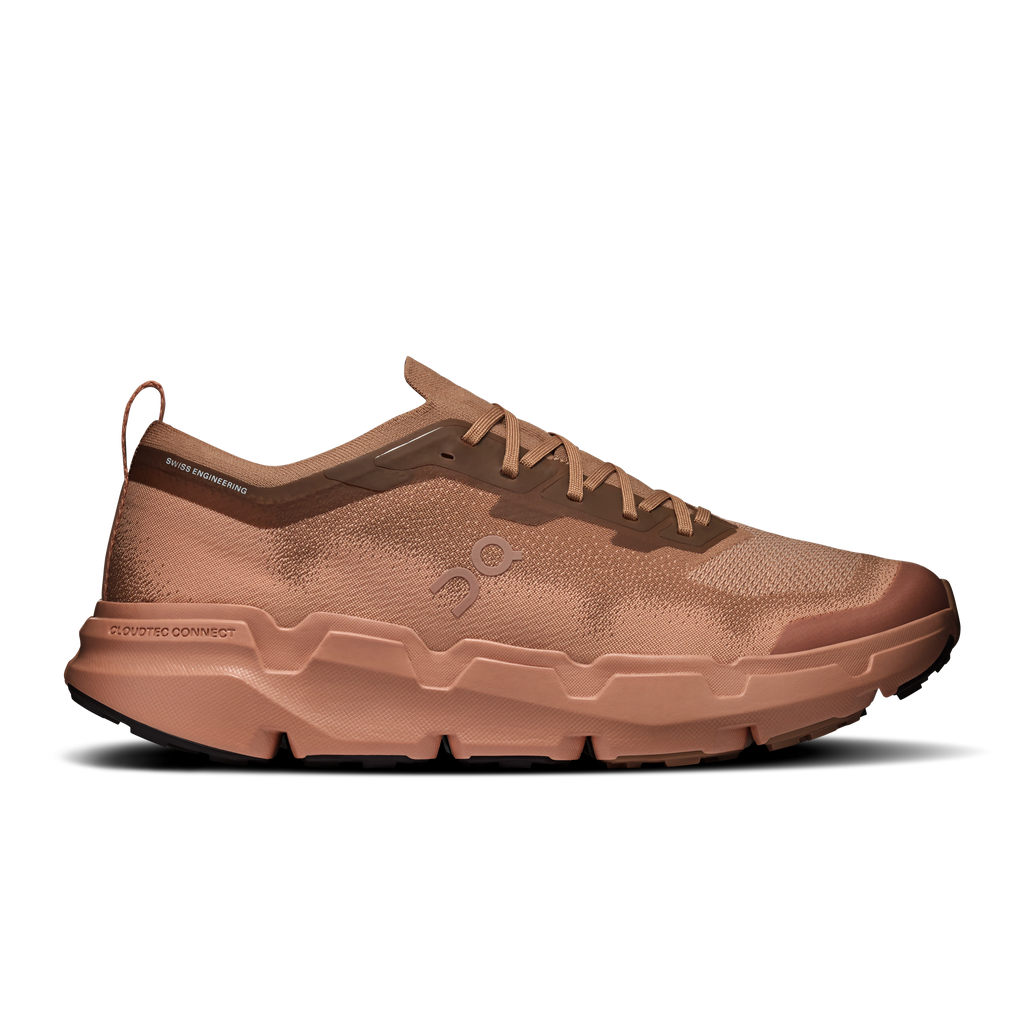On men's running shoes in tan-brown with lace-up front and cushioned sole