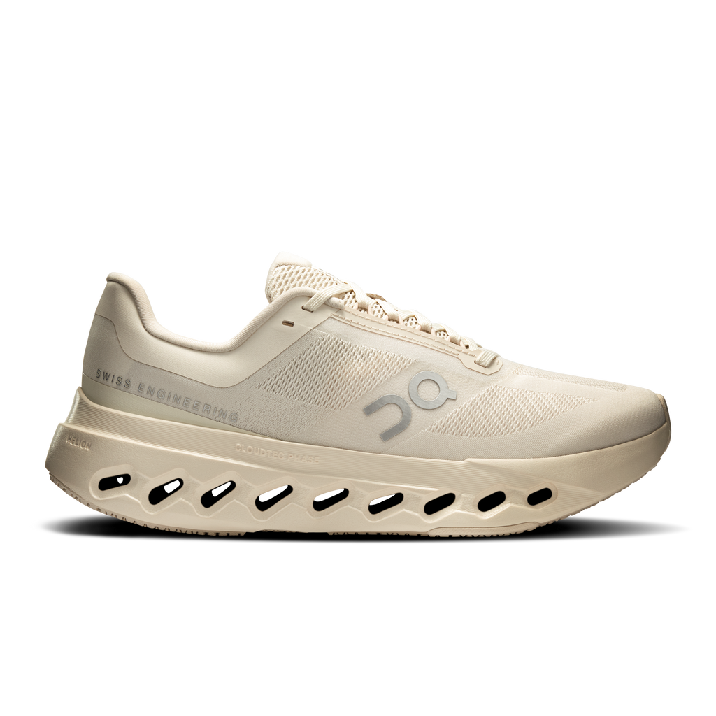 Women's running shoes, light beige mesh upper with CloudTec-style cutout sole