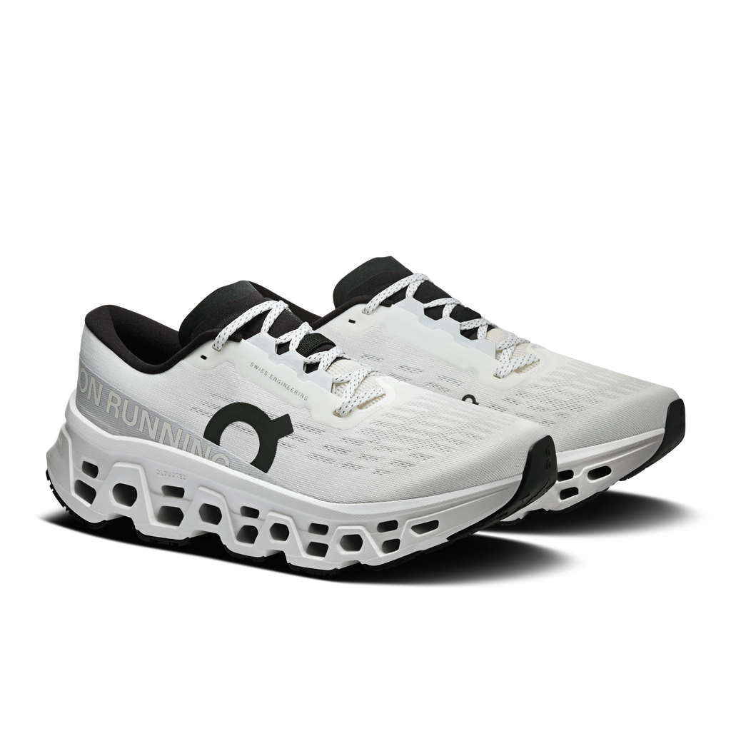 Women's white running shoes, side view, black accents, lace-up with padded collar
