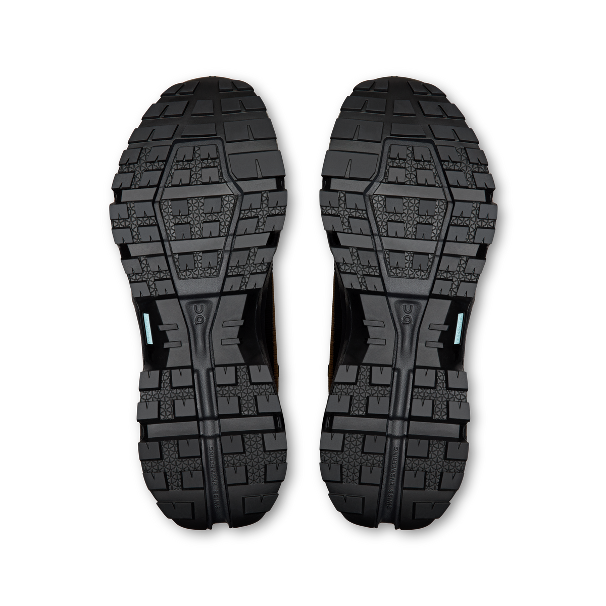 Pair of men’s mid waterproof hiking shoe outsoles with deep traction tread pattern