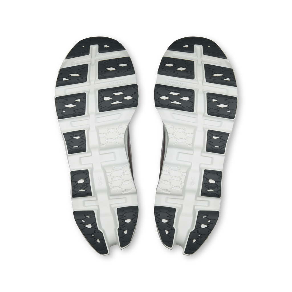 Pair of On Cloudmonster 3 shoes with white outsole tread and black traction pods