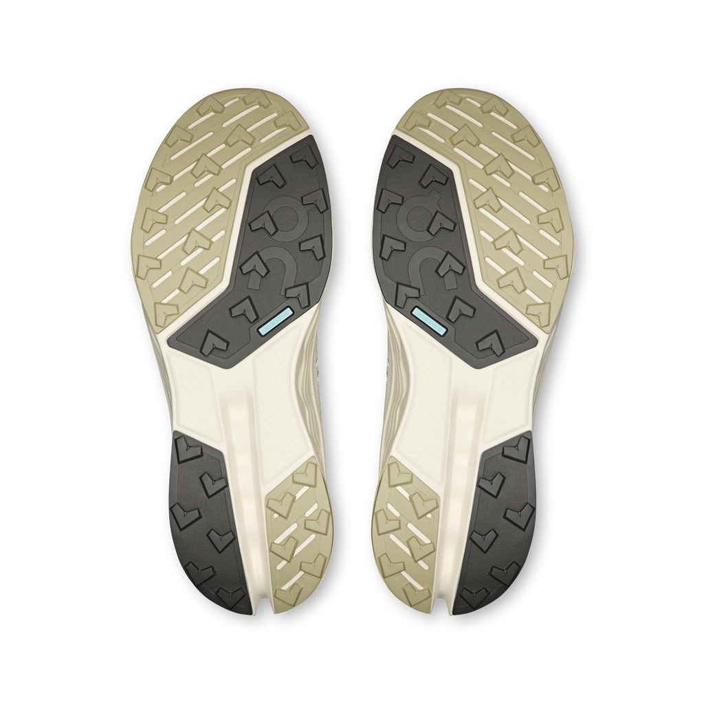 Pair of shoe outsoles with rugged tread pattern for trail traction
