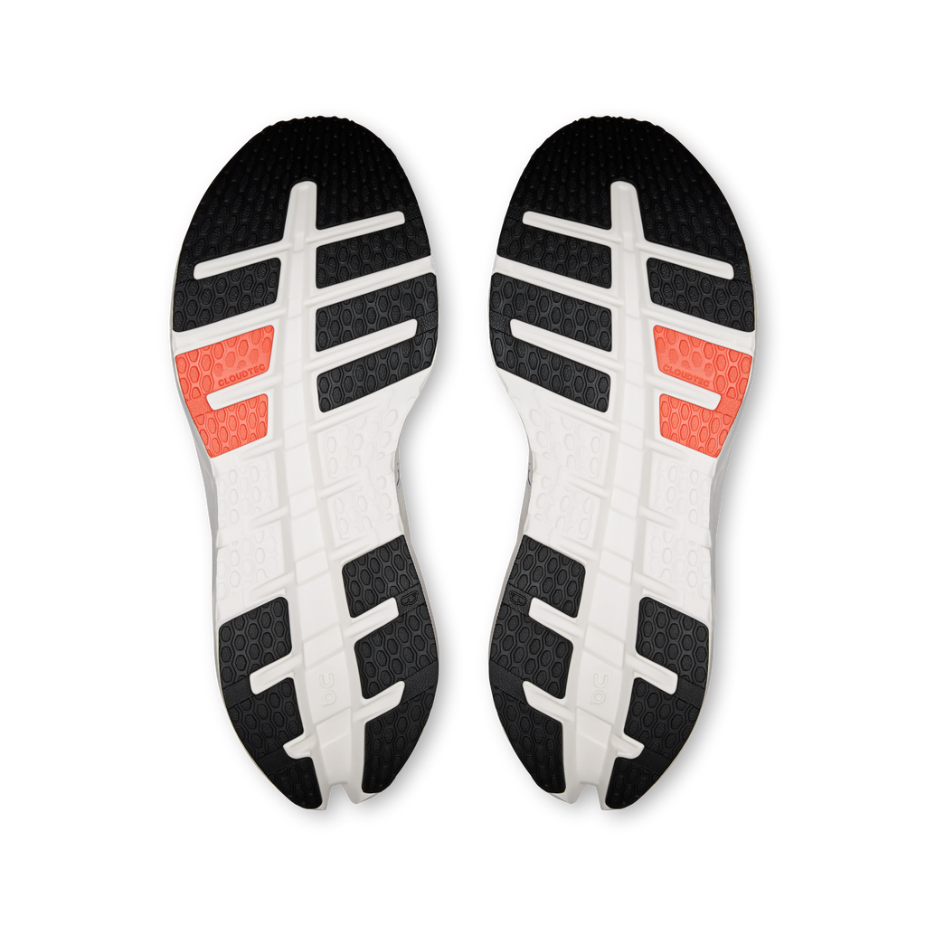 Men's running shoe outsoles, white tread with orange heel traction blocks