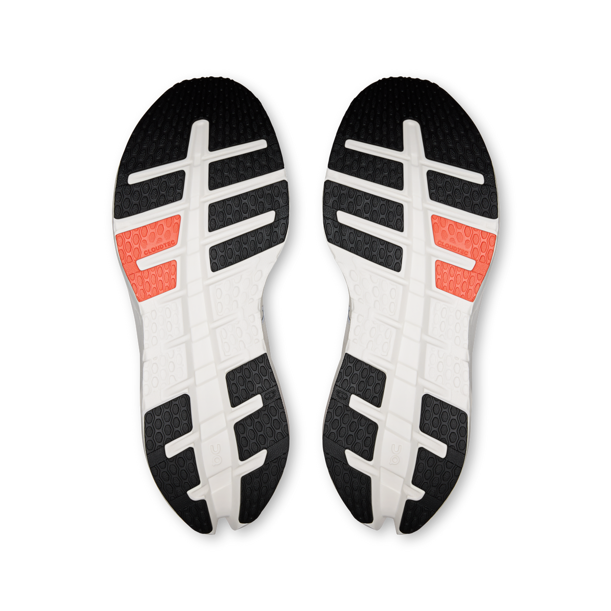 Men's running shoe outsoles, white tread with orange heel traction blocks