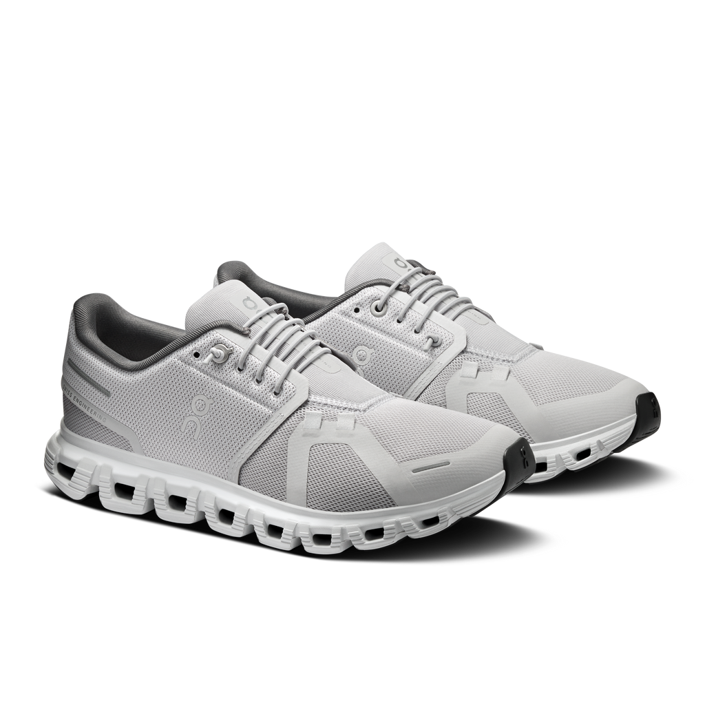 Pair of women’s On Cloud 6 running shoes in light gray with dark heel details