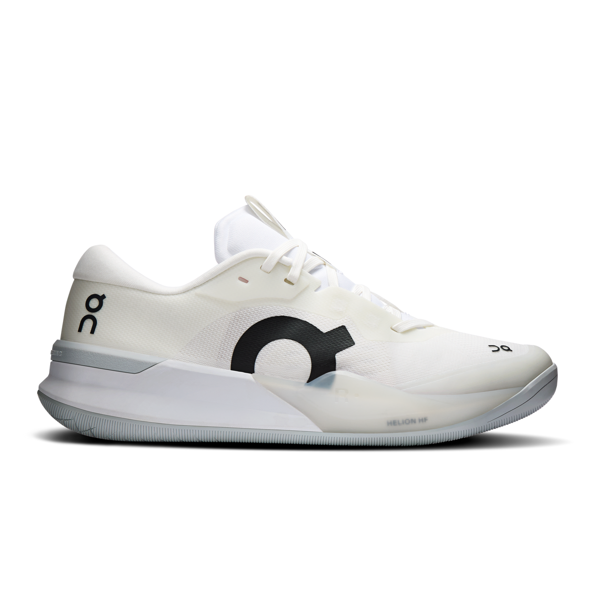 White women's running shoes with black logo, gray sole and subtle pink accents