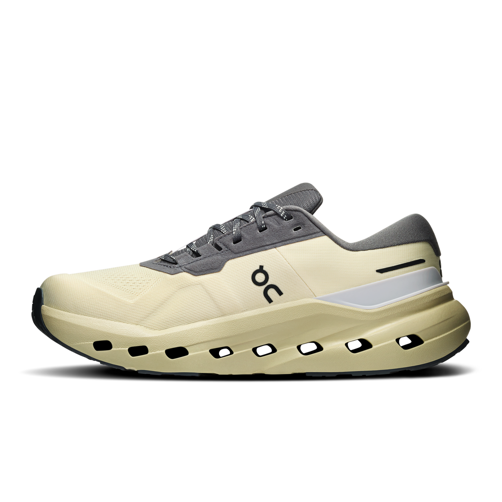 Women's waterproof running shoe, pale yellow midsole with dark gray upper and lace-up.