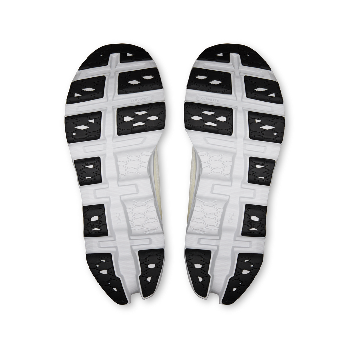 On running shoe outsoles, white rubber with black grip pods