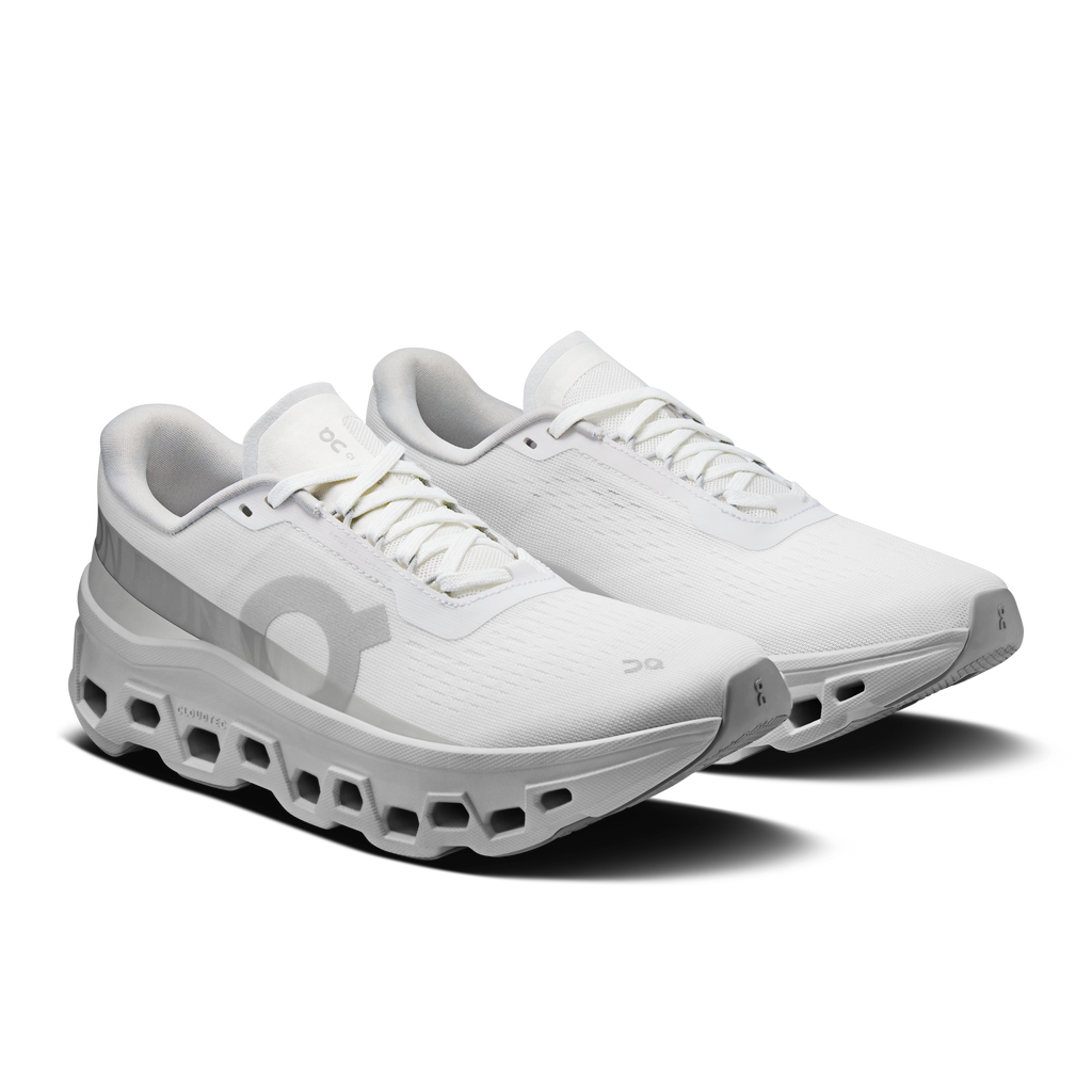 White women's running shoes, side view, lace-up mesh upper and CloudTec pods