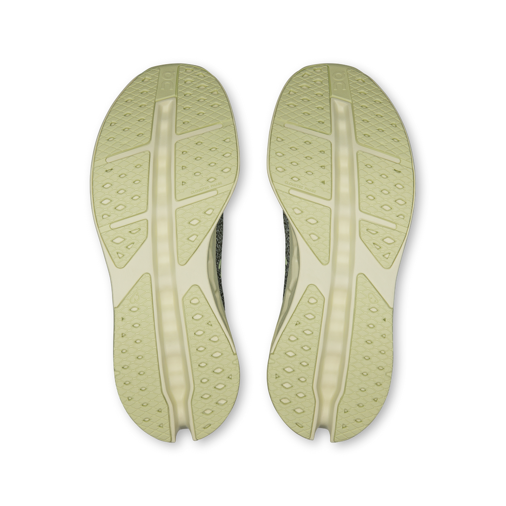 Pair of shoe outsoles in light seedling color with tread and center support channel