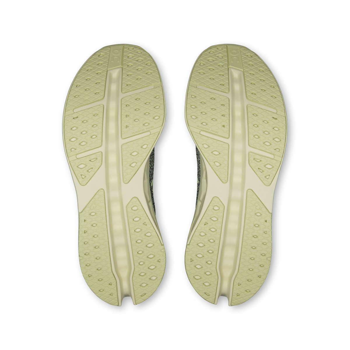 Pair of shoe outsoles in light seedling color with tread and center support channel