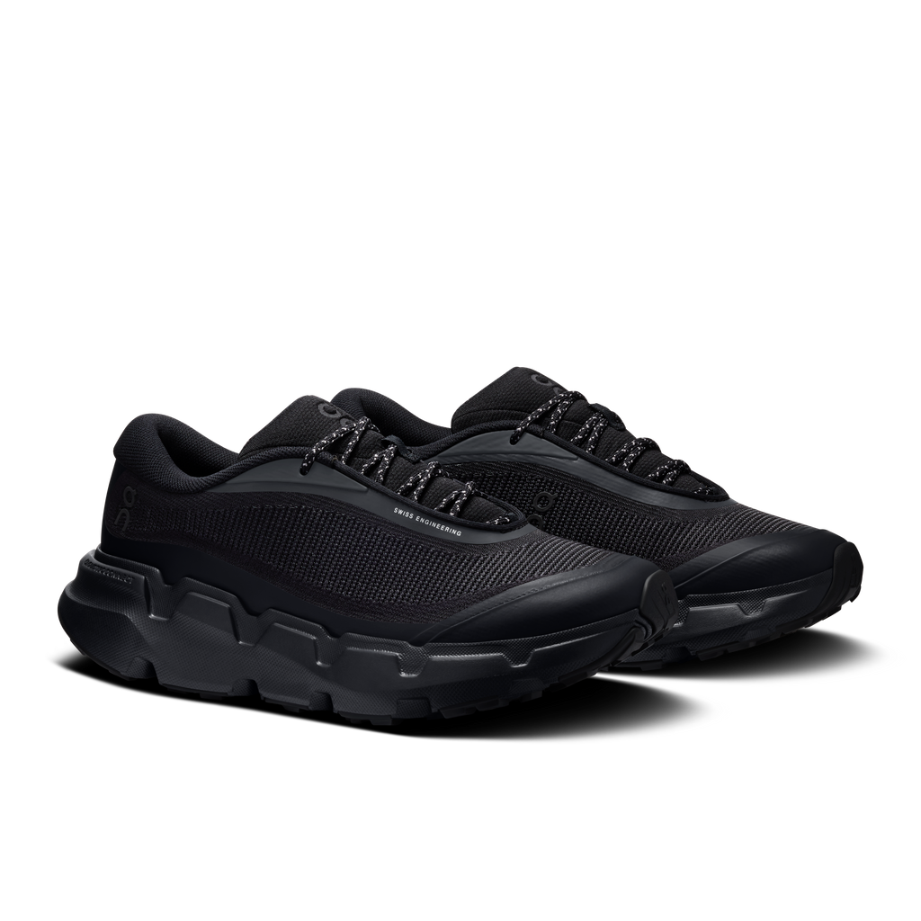 Black lace-up trail shoes with textured upper and rubber toe and side panels