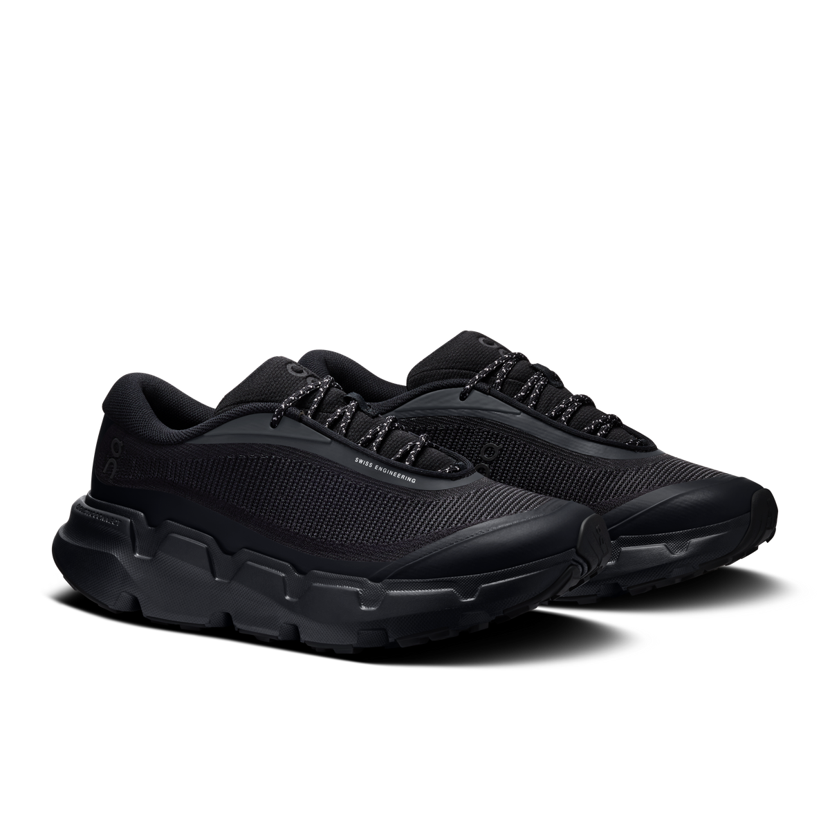 Black lace-up trail shoes with textured upper and rubber toe and side panels