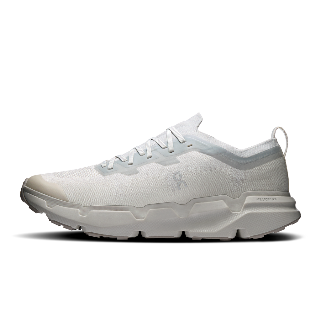 Men's running shoes with white textured upper, lace-up front, and chunky Cloud-style sole