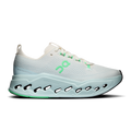 Women’s running shoes with ivory knit upper, green accents, and cloud-style pods