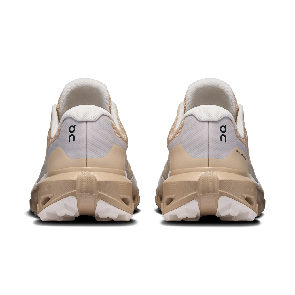 Women’s waterproof running shoes heel view with padded collar and sand-toned outsole
