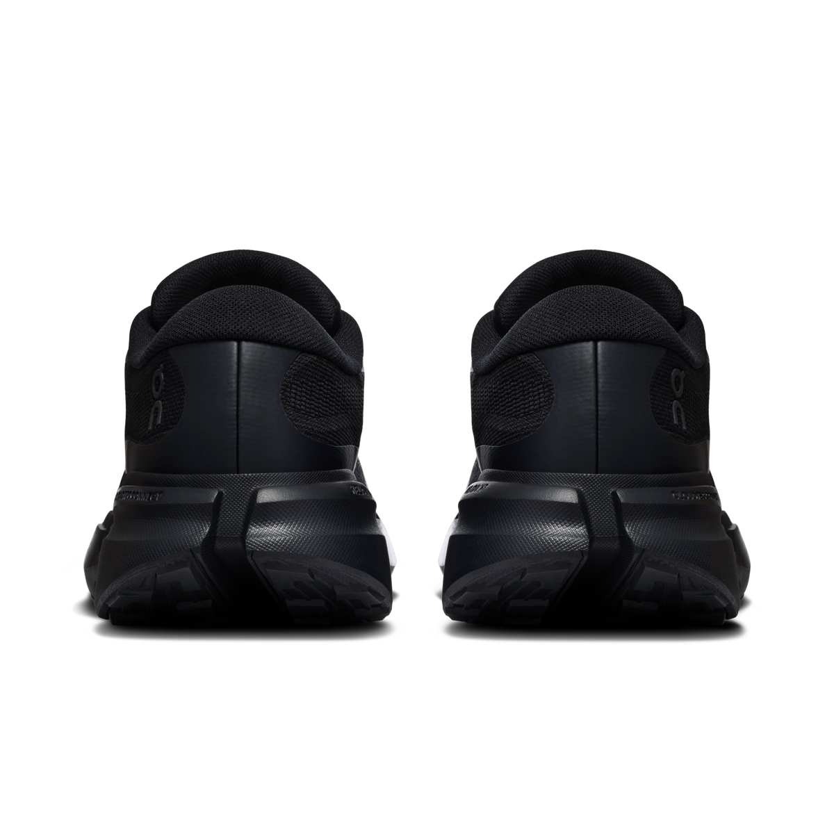 On Cloudsoma Hike men's black trail shoes, rear view with heel pull tab and tread