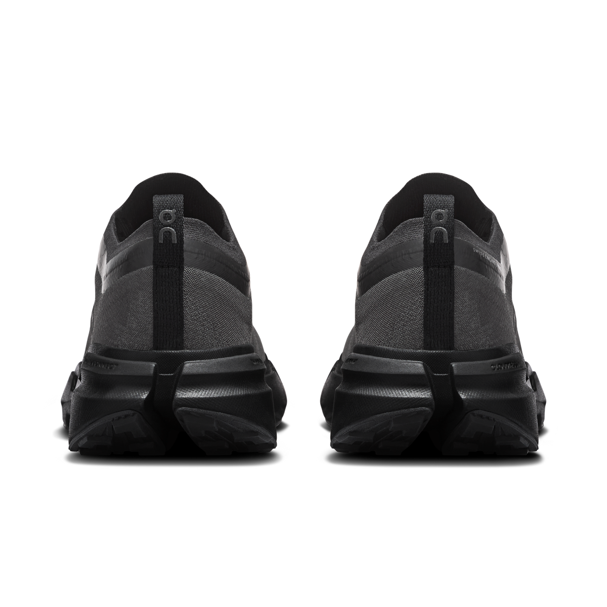 Women's black running shoes seen from heel with cushioned back and pull-tab