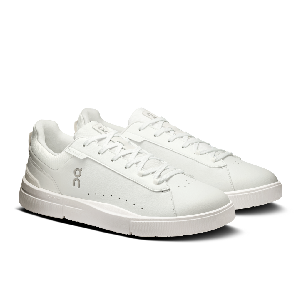 White lace-up sneakers with textured side panel and rubber outsole