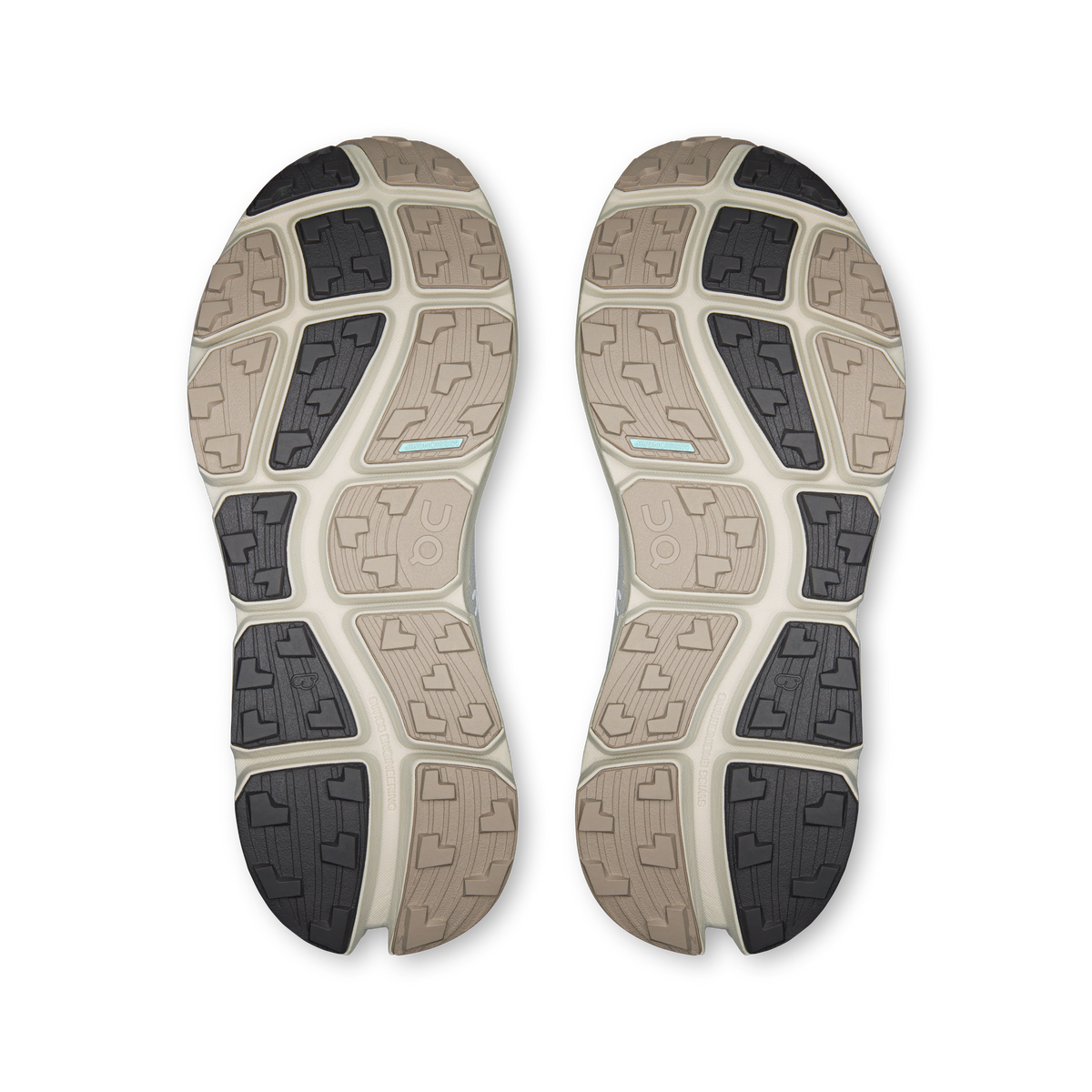 Women’s running shoes outsole view, textured traction tread with dark and light panels