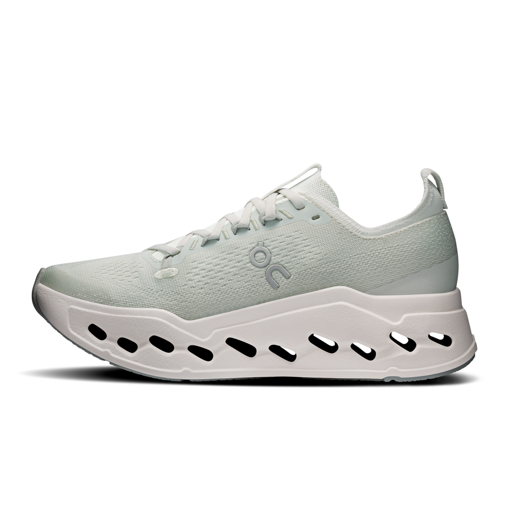 On women's running shoes, light mint knit sneaker with white rocker sole