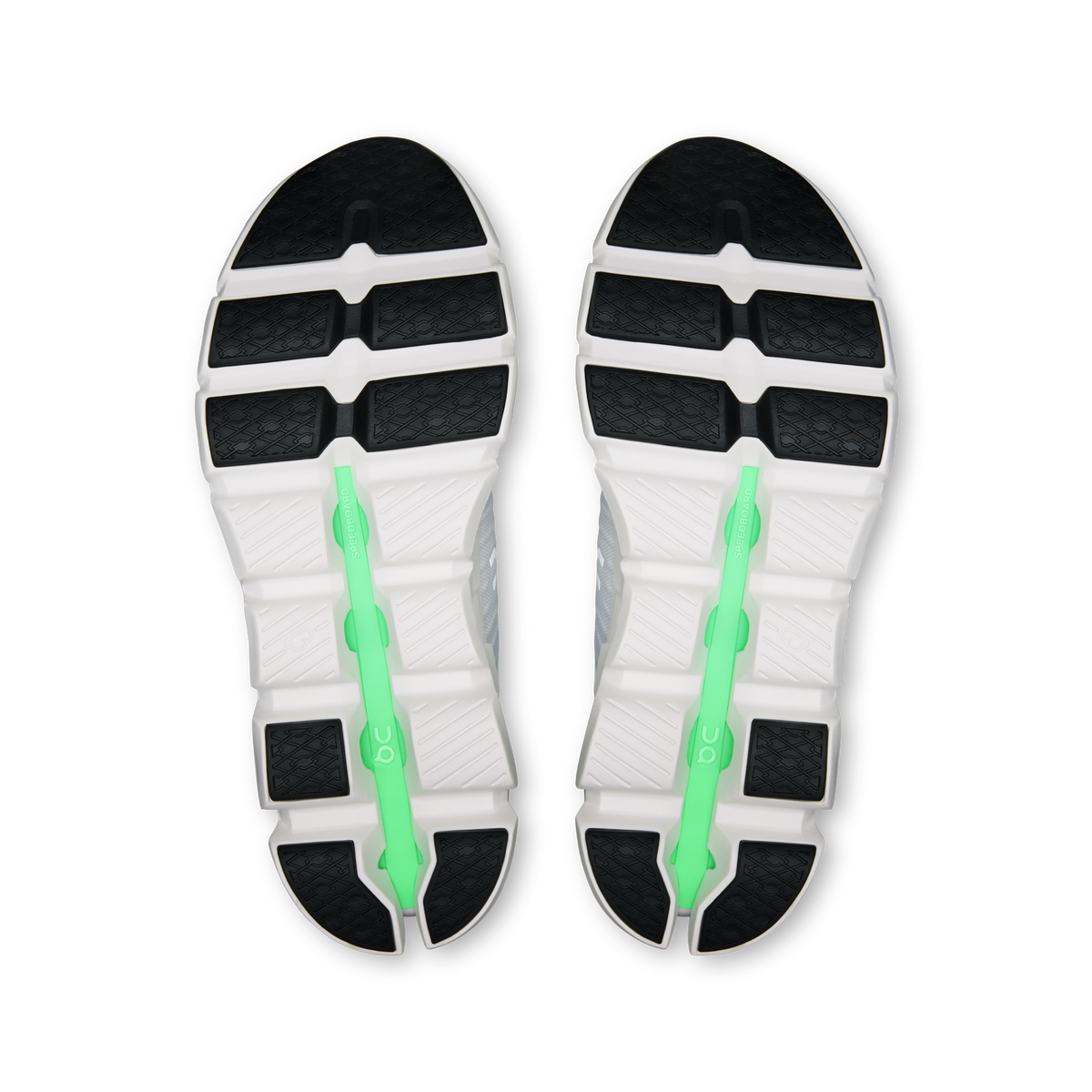 Shoe outsole view: dark tread with white base and green support spine
