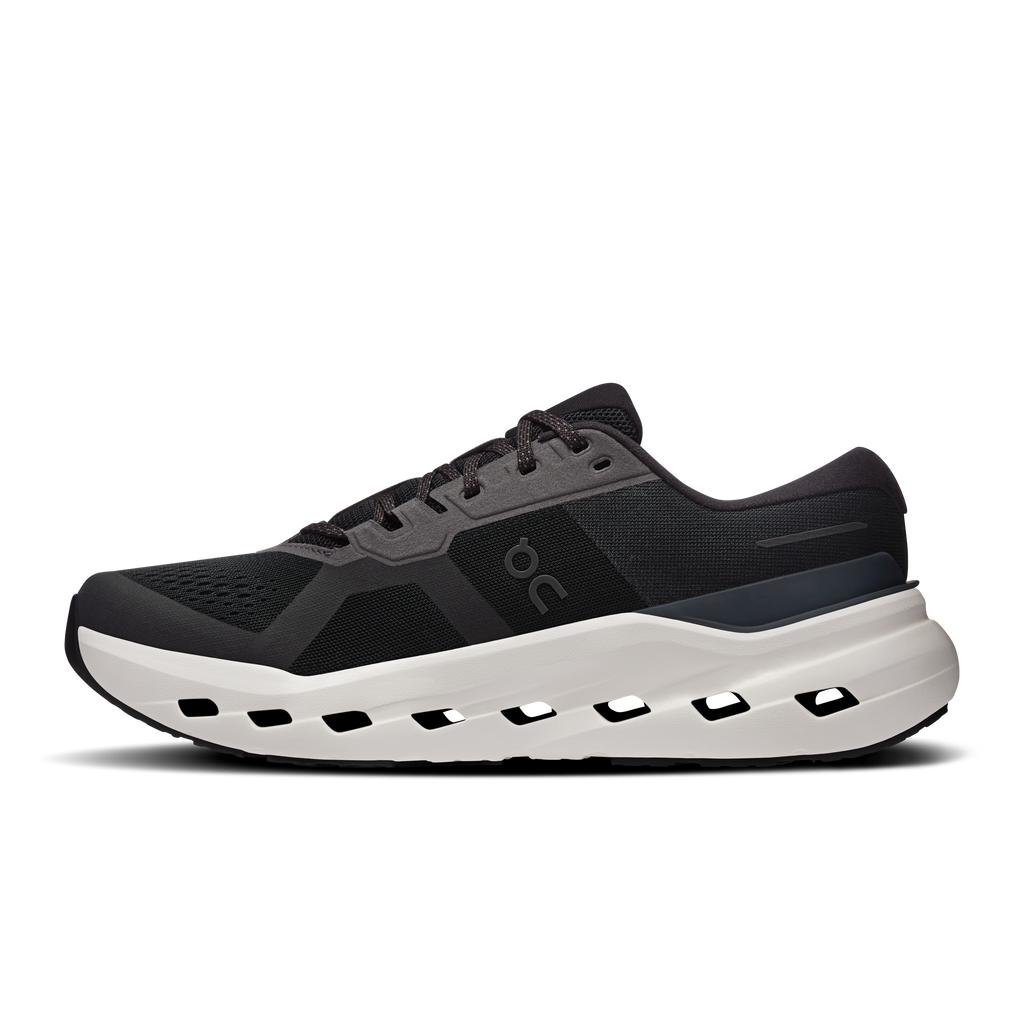 Black lace-up running shoe with white cushioned sole and gray logo panels