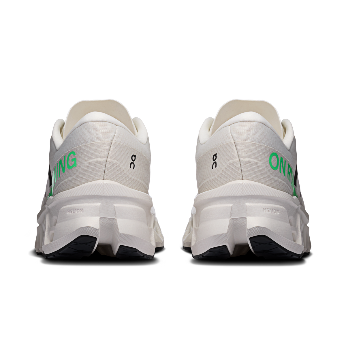 Ivory wide running shoe heel view with green logo stripe and padded collar