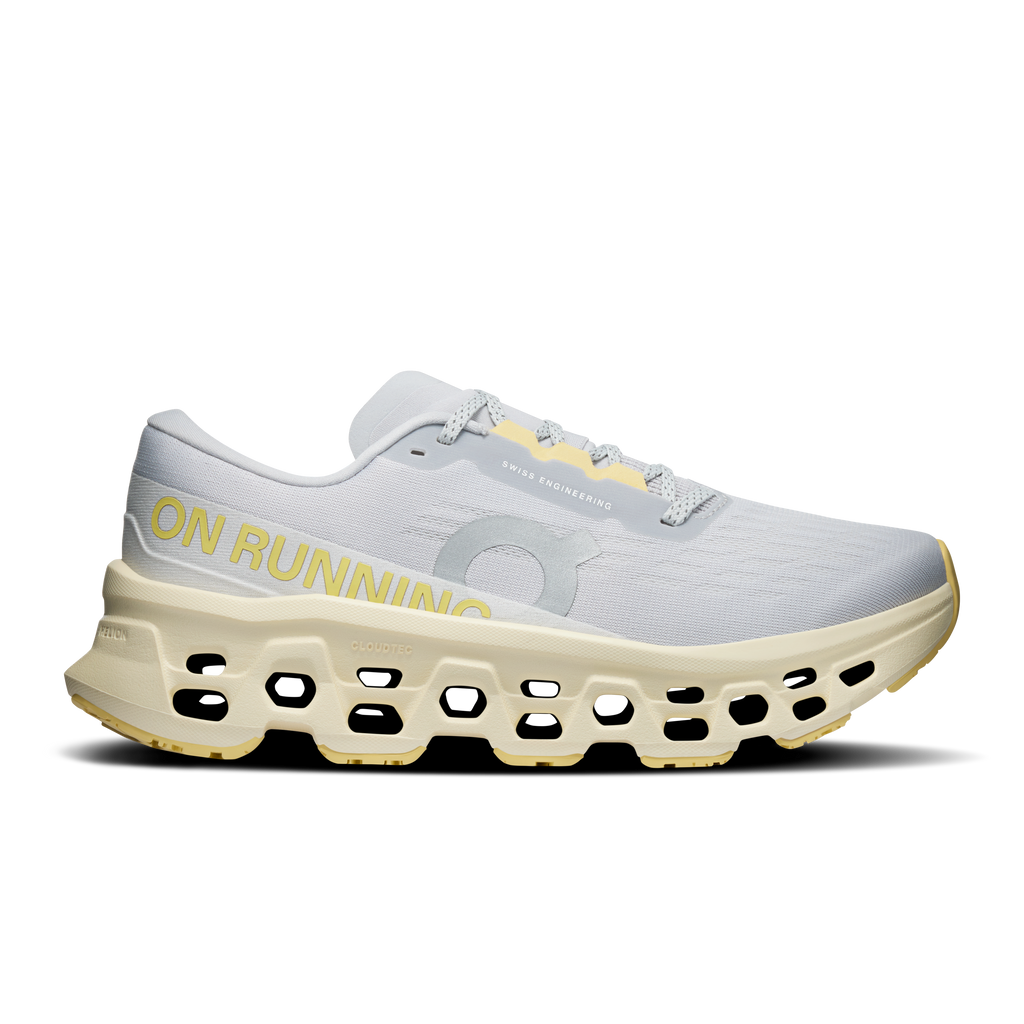 On Cloudmonster 3 running shoe in light gray with yellow foam midsole