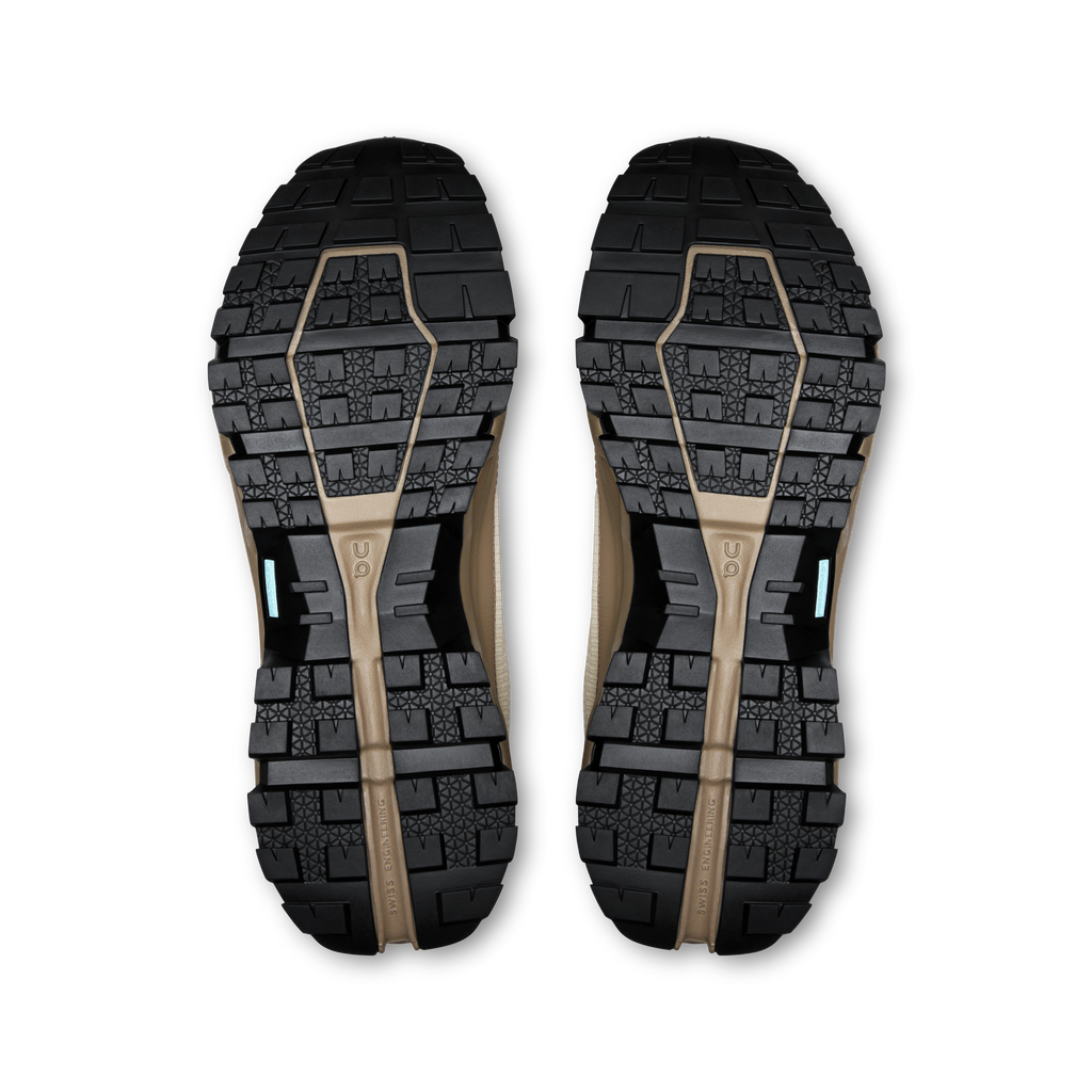 Pair of outsoles with deep tread blocks for traction and grip
