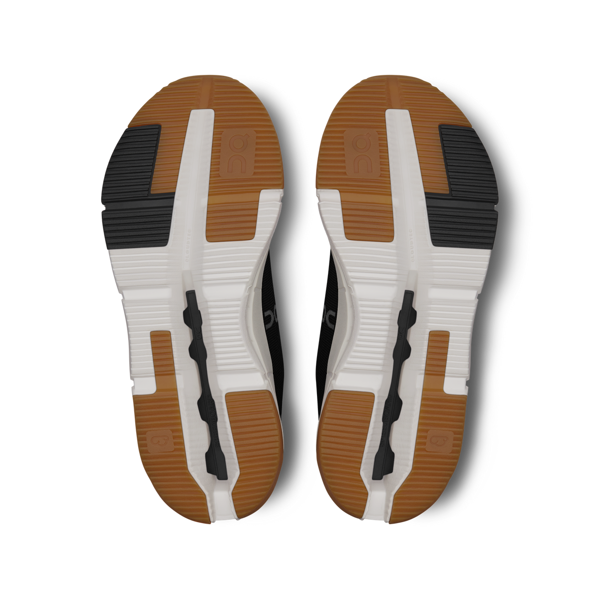 Cloudnova women's outsole view, white base with black tread and brown rubber pads
