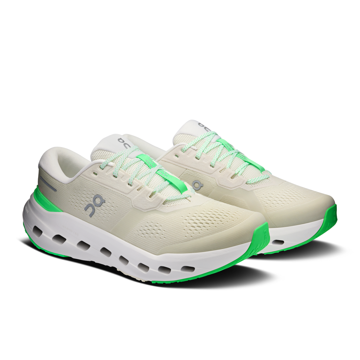 Men's wide lace-up running shoe in light cream with mint-green overlays and white outsole