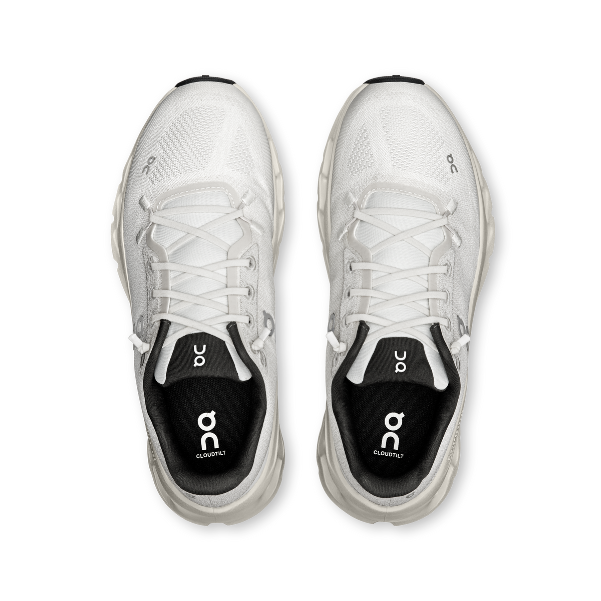 Pair of women's running shoes with white laces and black padded collars