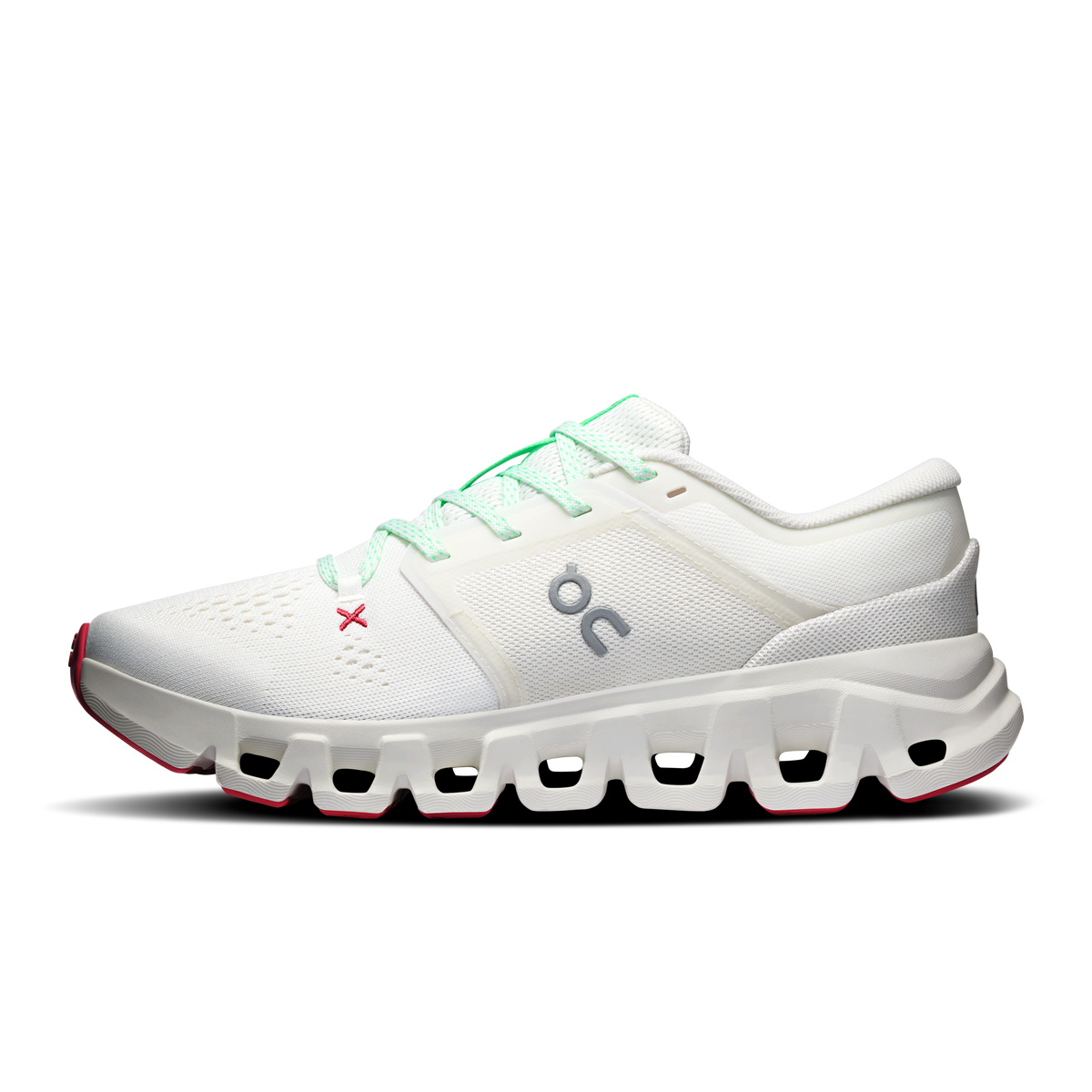 Women's ivory running shoe with mint-green laces and thick white CloudTec sole