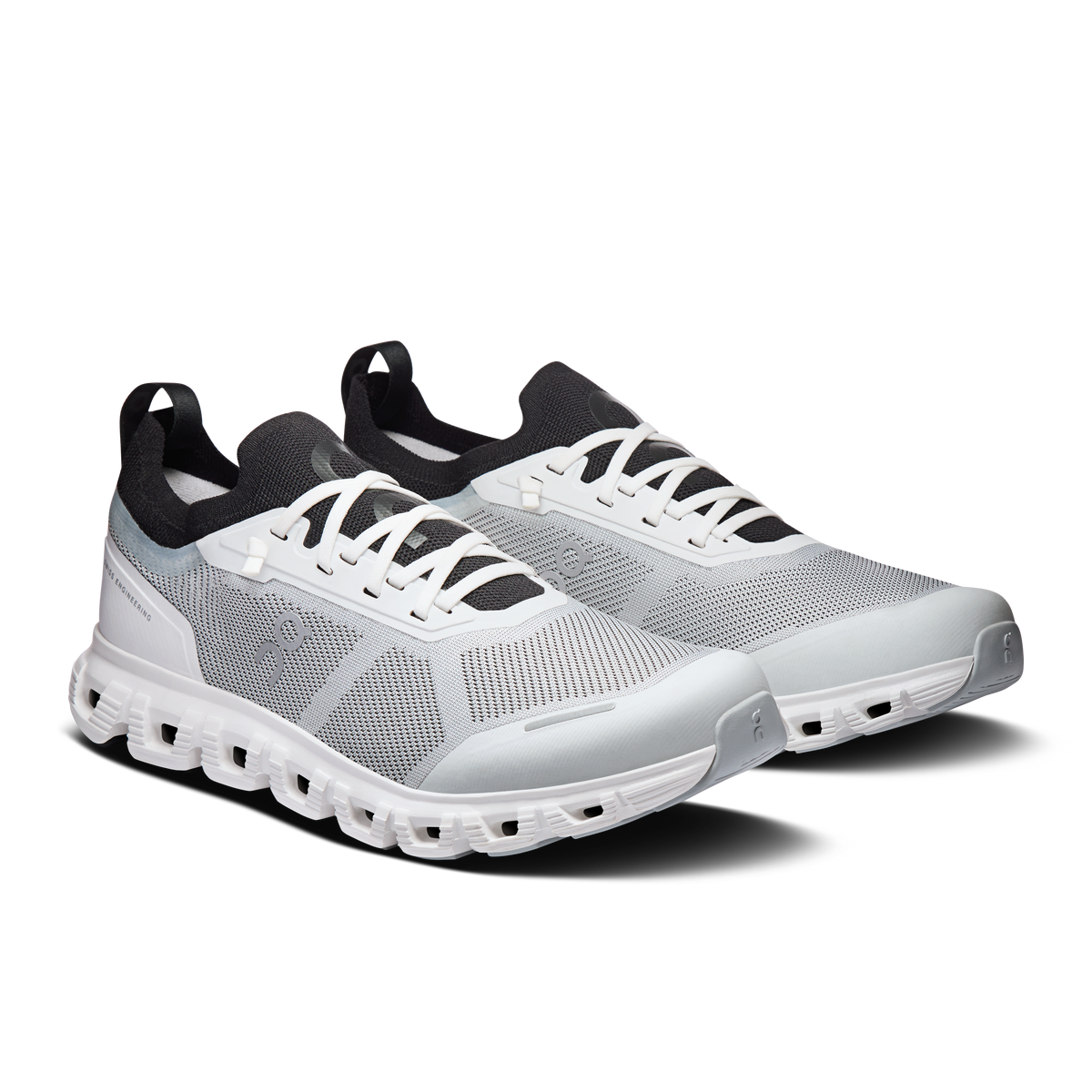 On Cloud 6 Versa men's running shoes pair, white uppers with black heel accents