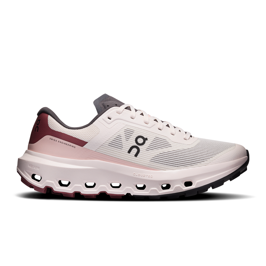 Women's running shoes, white knit with maroon side panels and cushioned cloud tread sole.
