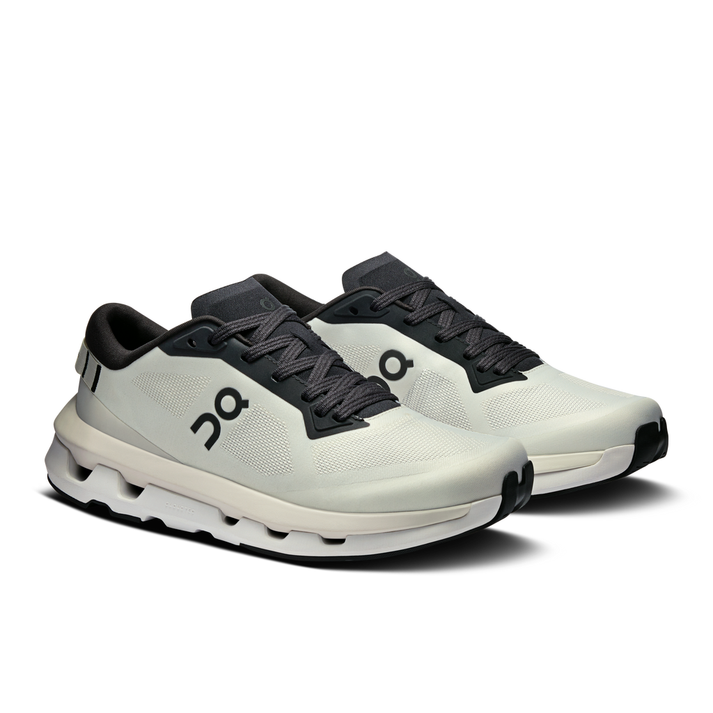 White running shoes with black laces and On logo on side