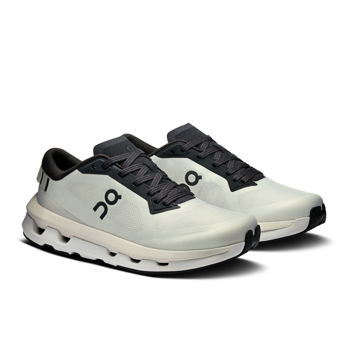 White running shoes with black laces and On logo on side
