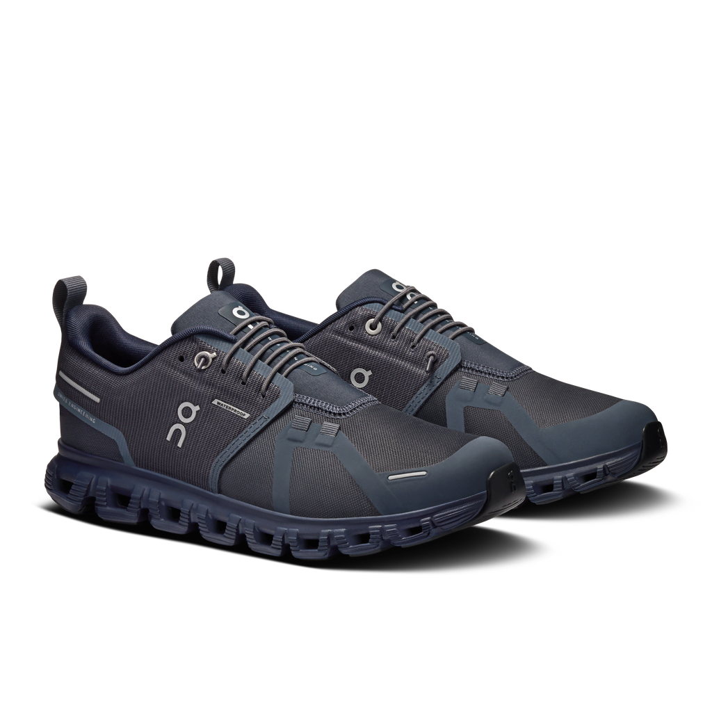 Pair of dark blue waterproof lace-up running shoes with CloudTec cushioning pods