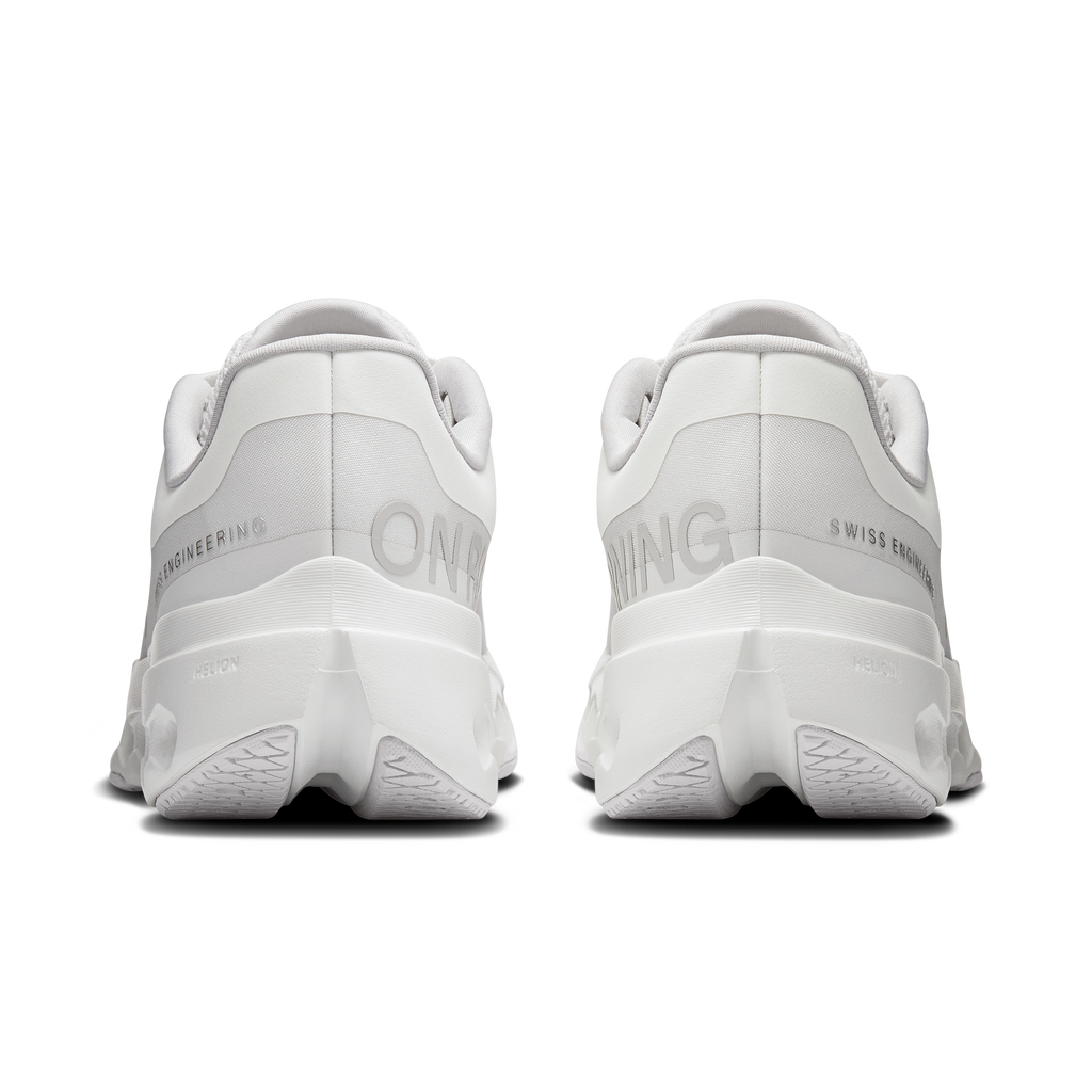 White women’s On running shoes, back view with padded heel and signature logo