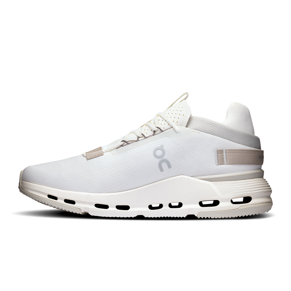 White lace-up running shoe with CloudTec podded sole and textured sand-pattern tongue