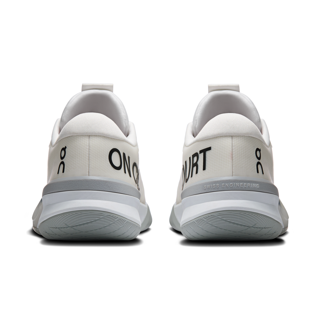 White women's running shoes back view with 'SWISS ENGINEERING' and 'ON' branding