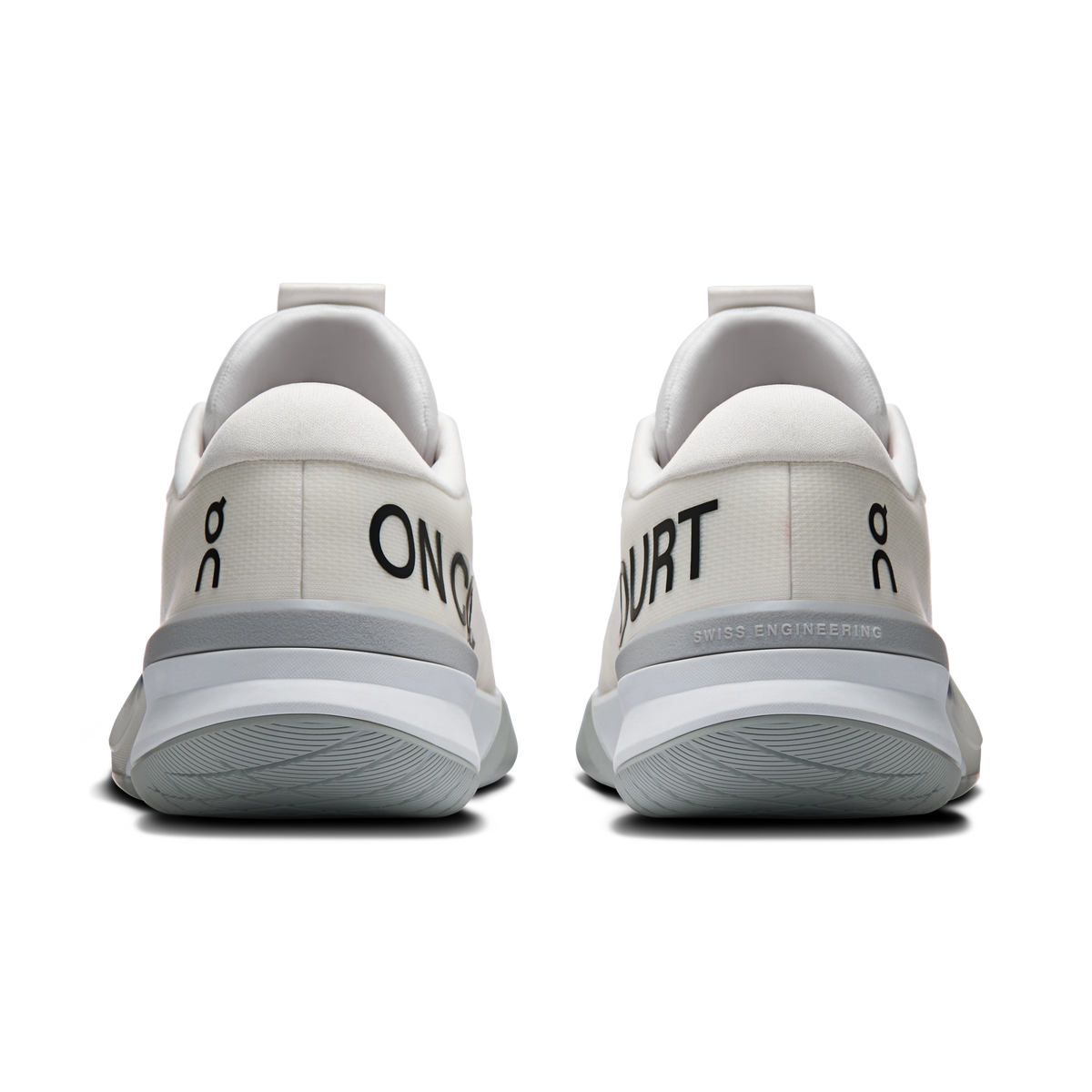 White women's running shoes back view with 'SWISS ENGINEERING' and 'ON' branding