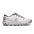 Women's white running shoes with black laces and padded heel collar